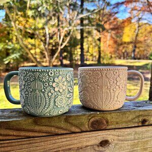 World Market “Jolly Hearts” Mugs, Lt Blue/White and Pink/White Floral Embossed